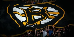 Boston Bruins NHL game with players on ice at TD Garden
