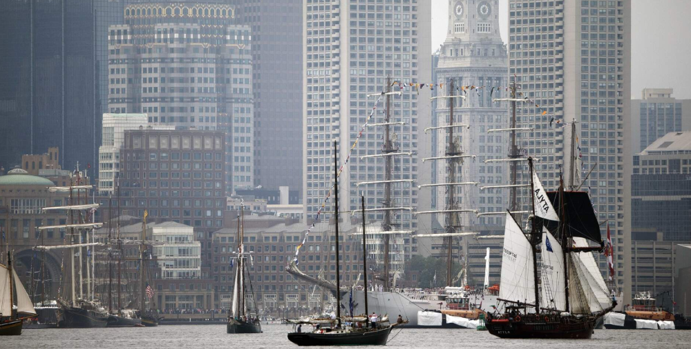 Tall ships sailing in Boston Harbor during Sail Boston festival