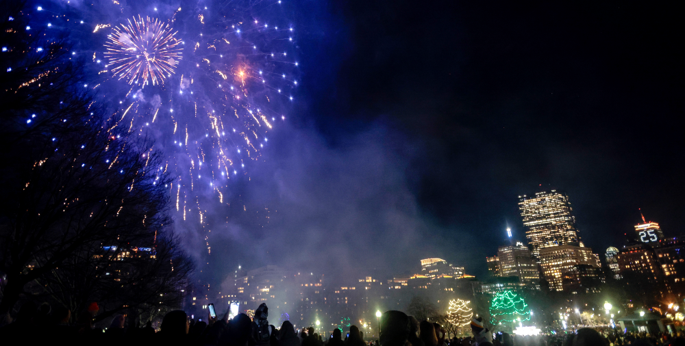 Fireworks and crowds celebrating First Night Boston 2026